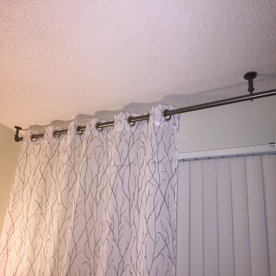 Curtains over blinds